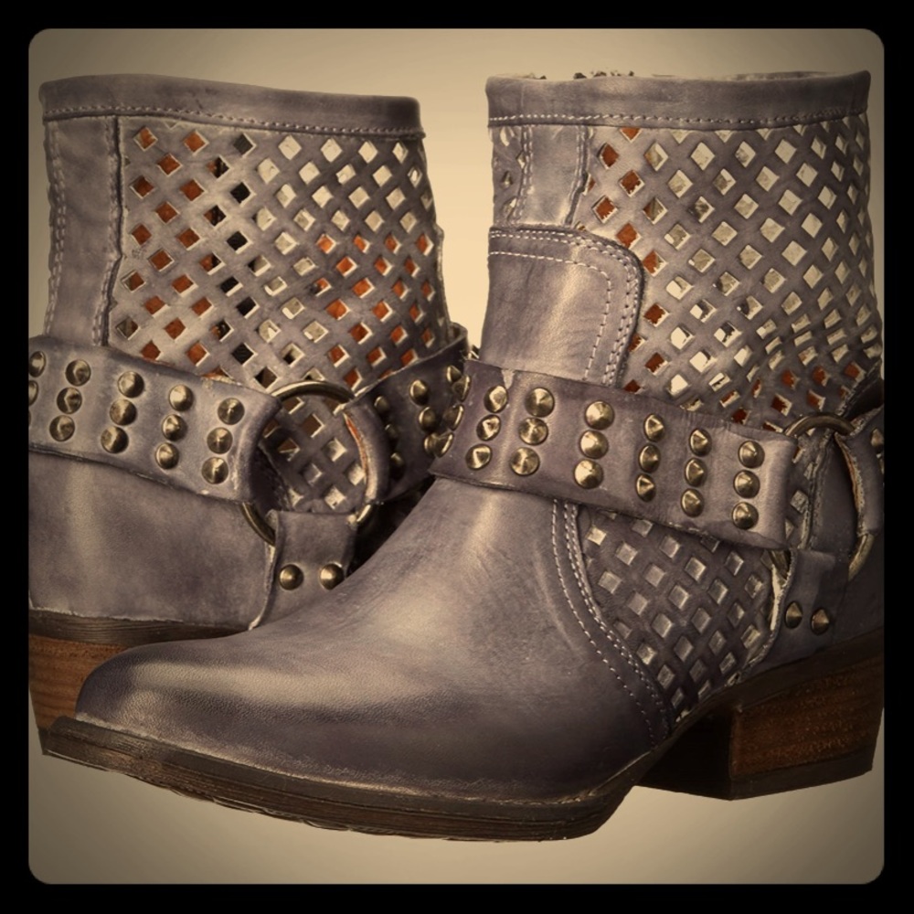 Distressed harness ankle boots